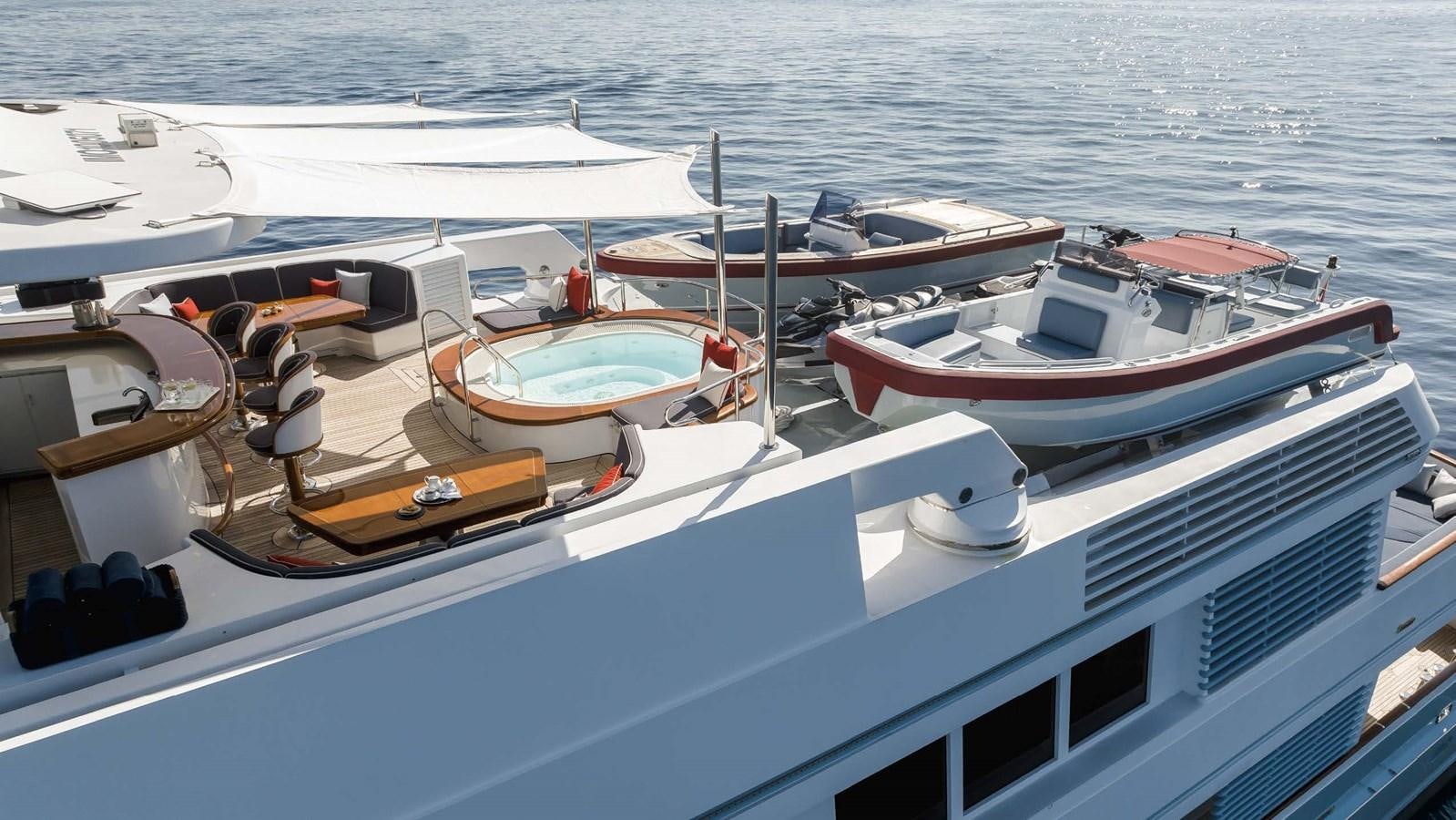 a group of boats on a body of water aboard OLYMPUS Yacht for Sale