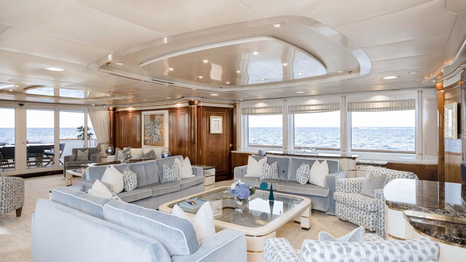 a living room with a large window aboard OLYMPUS Yacht for Sale