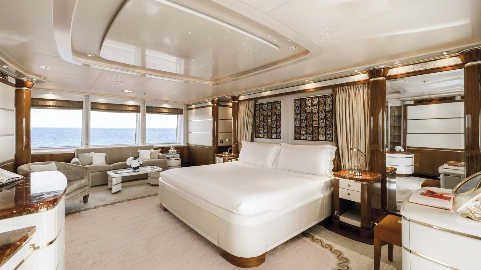a large bedroom with a large bed aboard OLYMPUS Yacht for Sale