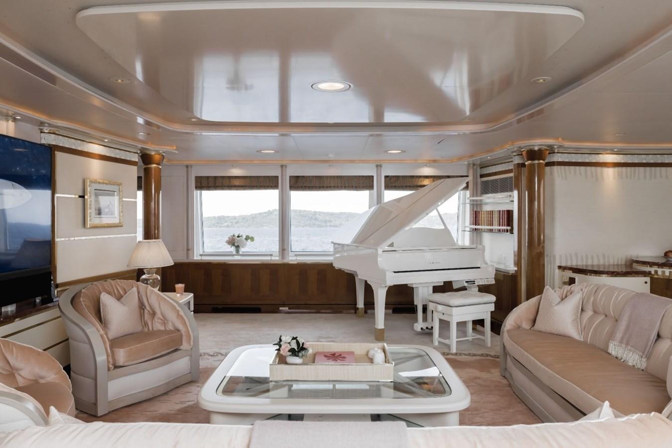 a living room with a large window aboard OLYMPUS Yacht for Sale