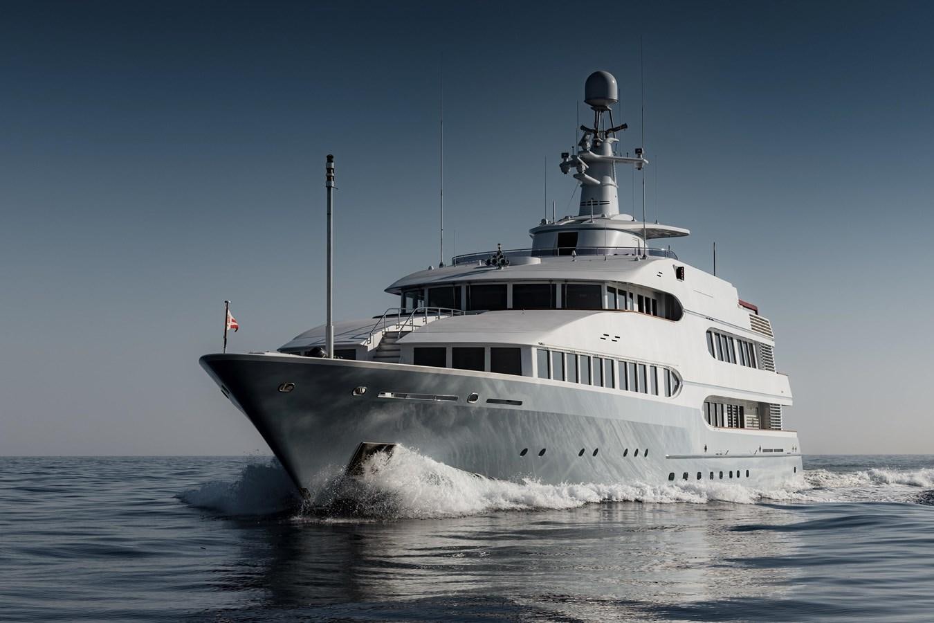 a large white boat in the water aboard OLYMPUS Yacht for Sale