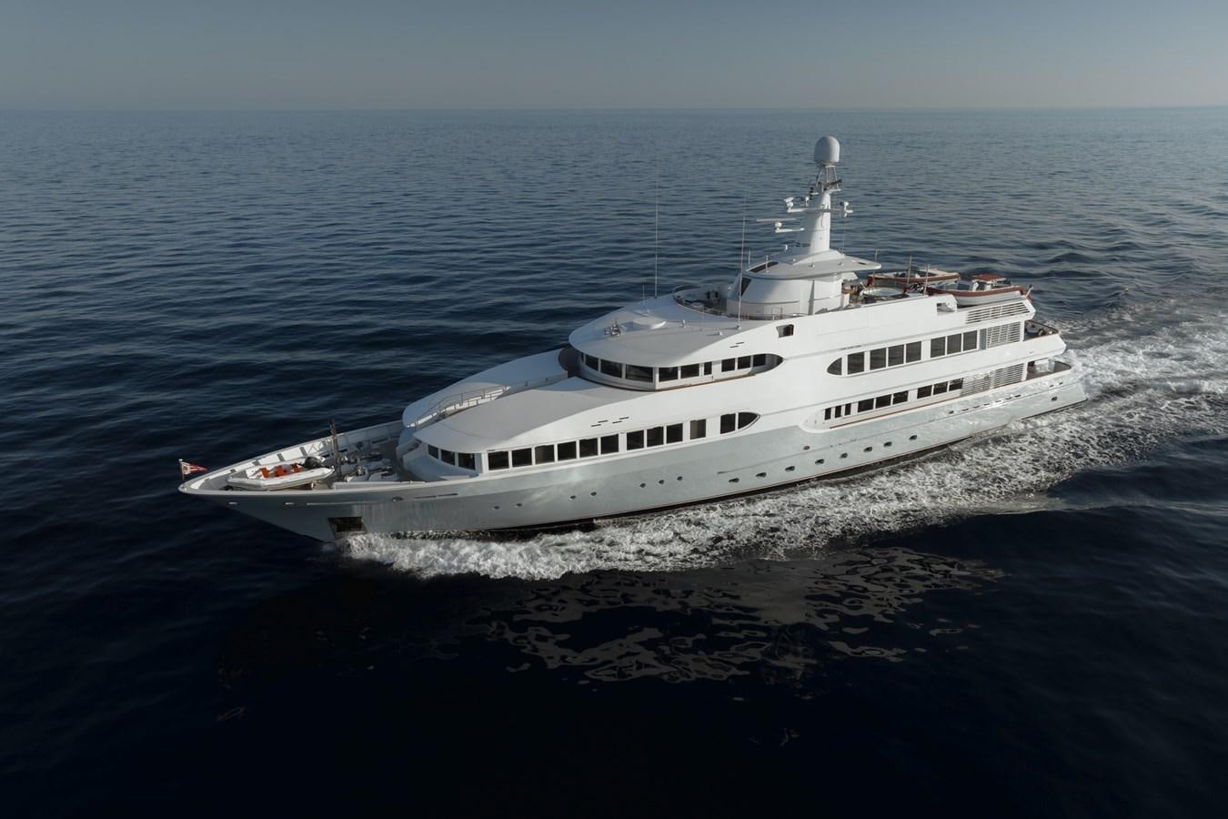a white yacht on the water aboard OLYMPUS Yacht for Sale