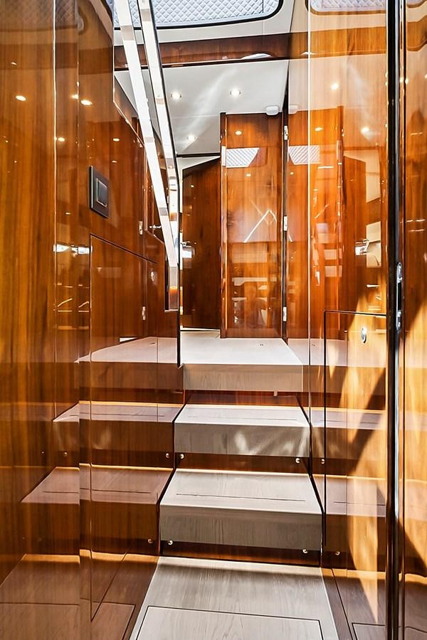 a glass wall with a glass door aboard RAW WAVE Yacht for Sale