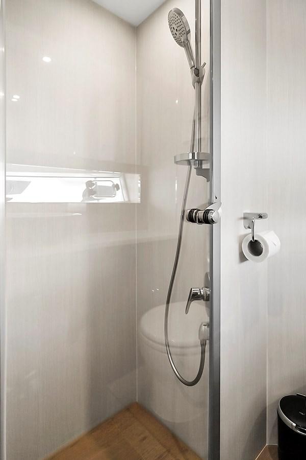a shower with a glass door aboard RAW WAVE Yacht for Sale