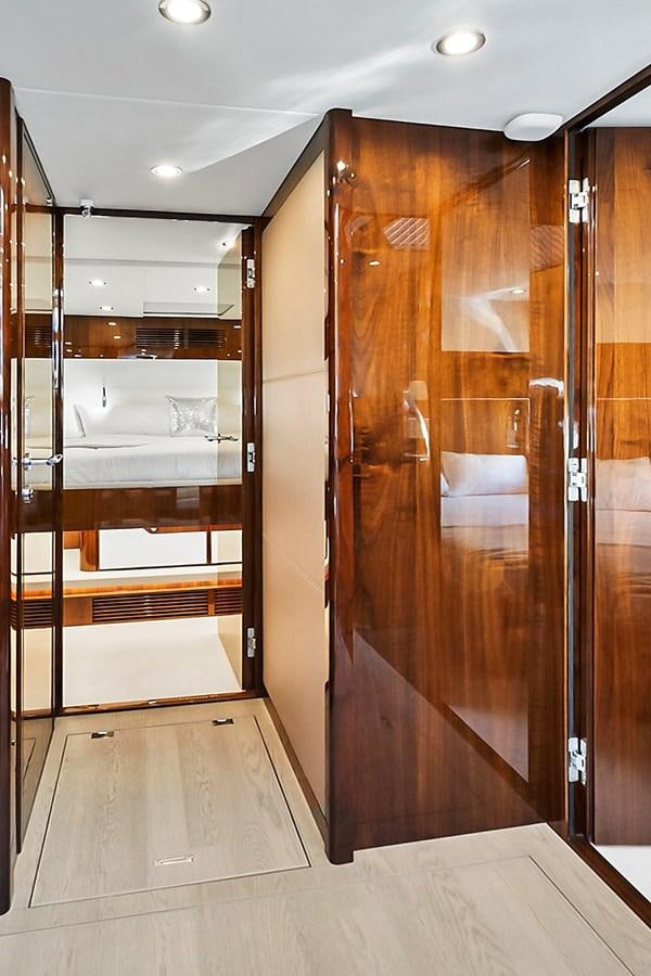 a room with a large closet aboard RAW WAVE Yacht for Sale
