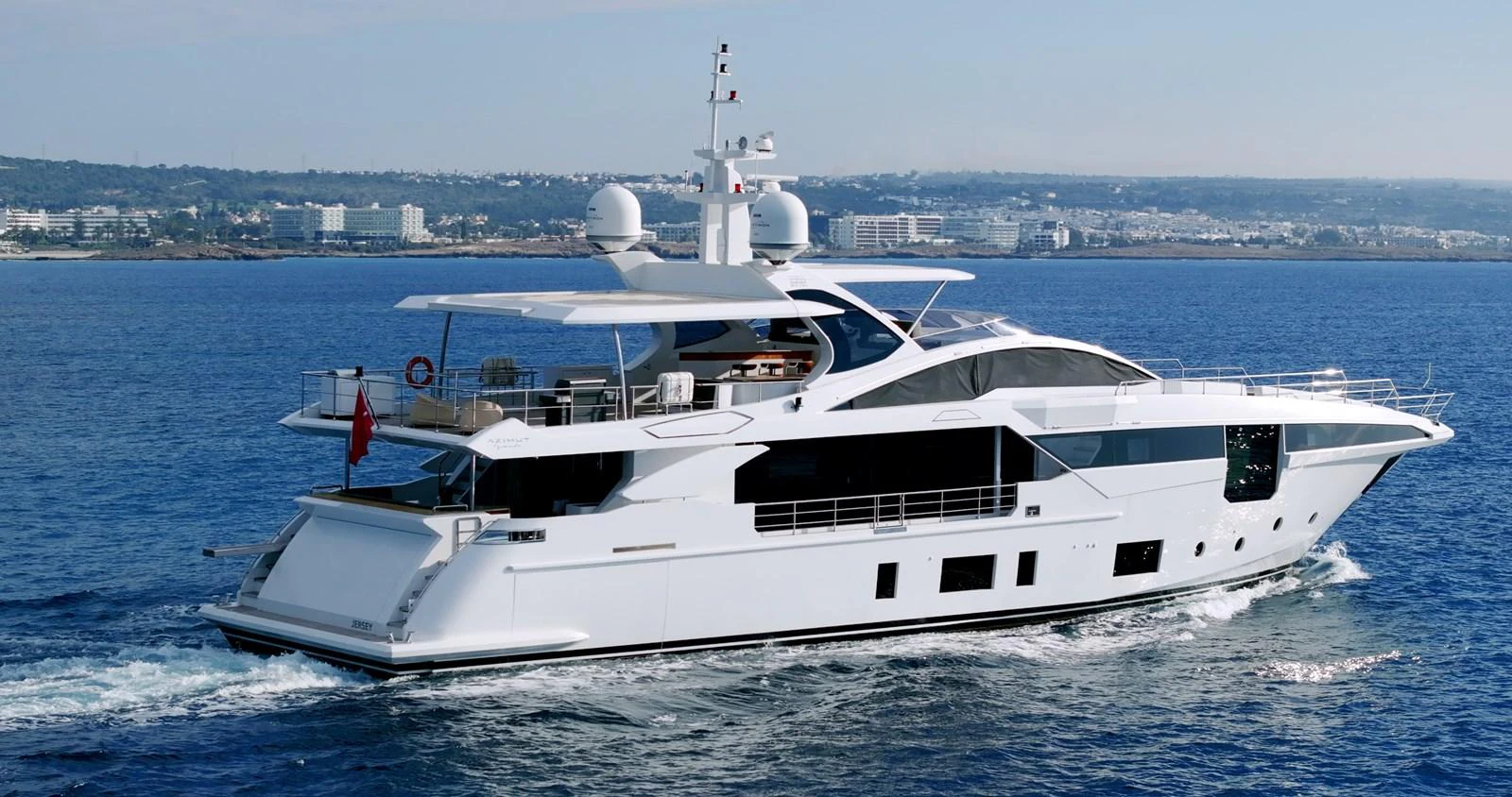 a white yacht on the water aboard IRYNA Yacht for Sale