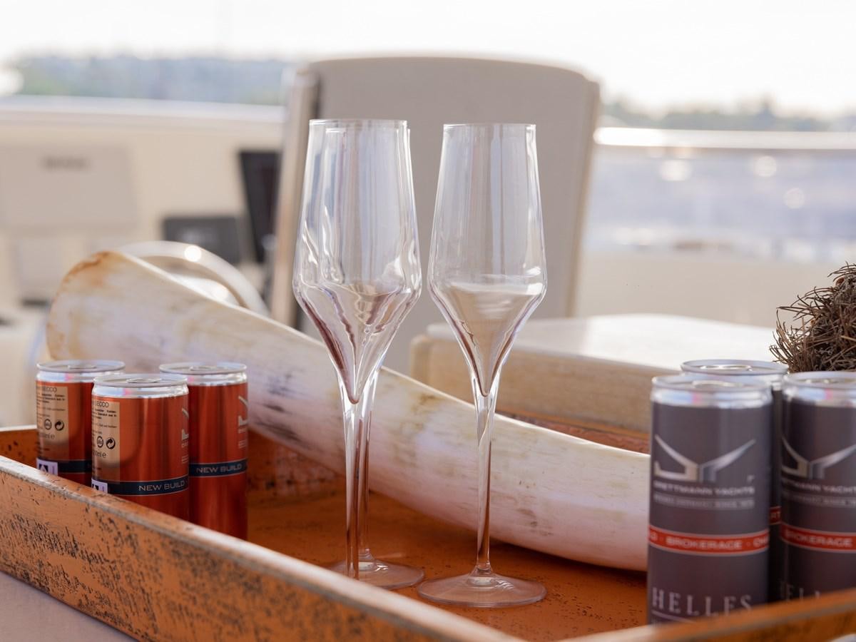 a couple of wine glasses aboard BANDIDO I Yacht for Sale