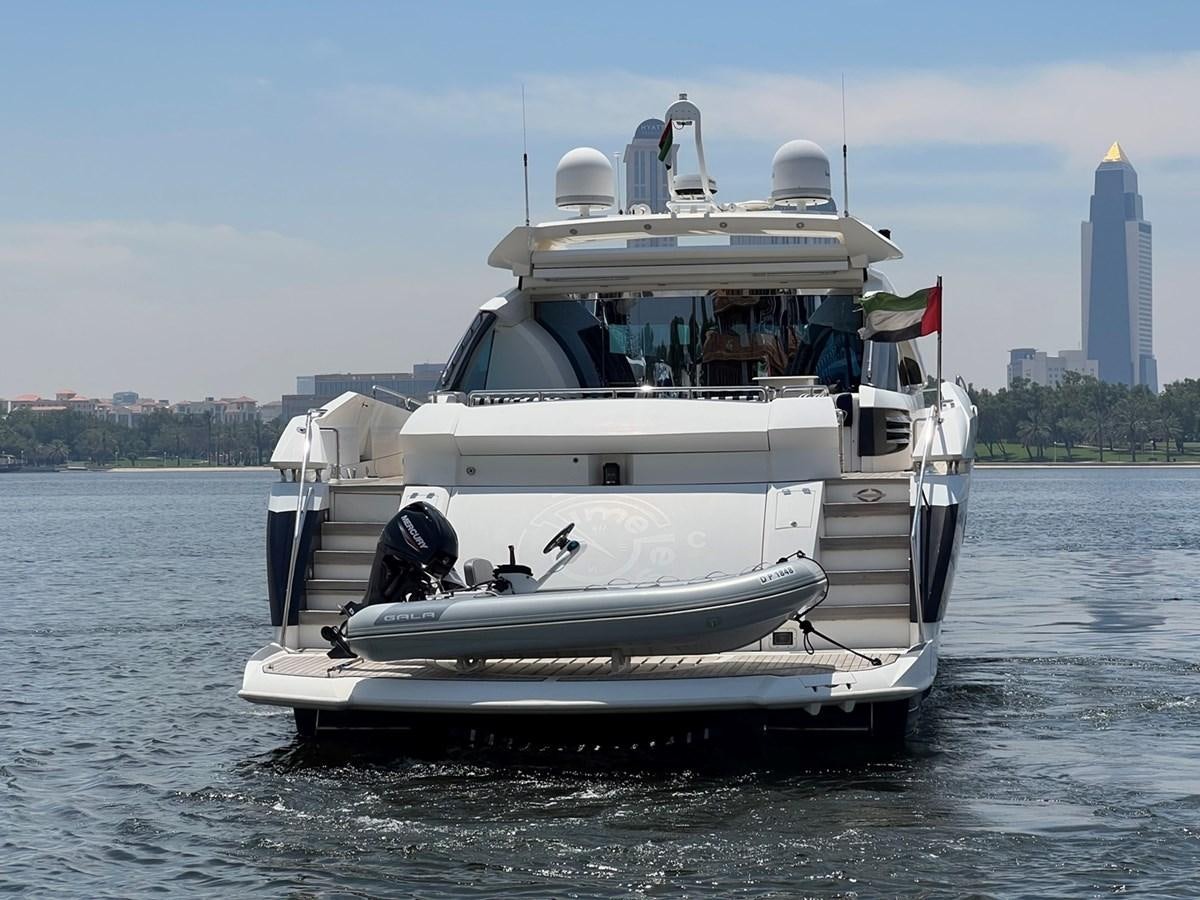 a boat on the water aboard SUNSEEKER 95 PREDATOR Yacht for Sale