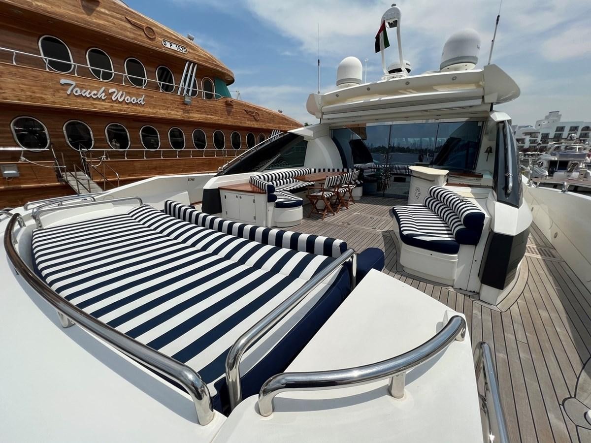 a boat on a deck aboard SUNSEEKER 95 PREDATOR Yacht for Sale