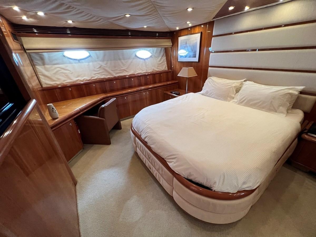 a bed in a room aboard SUNSEEKER 95 PREDATOR Yacht for Sale
