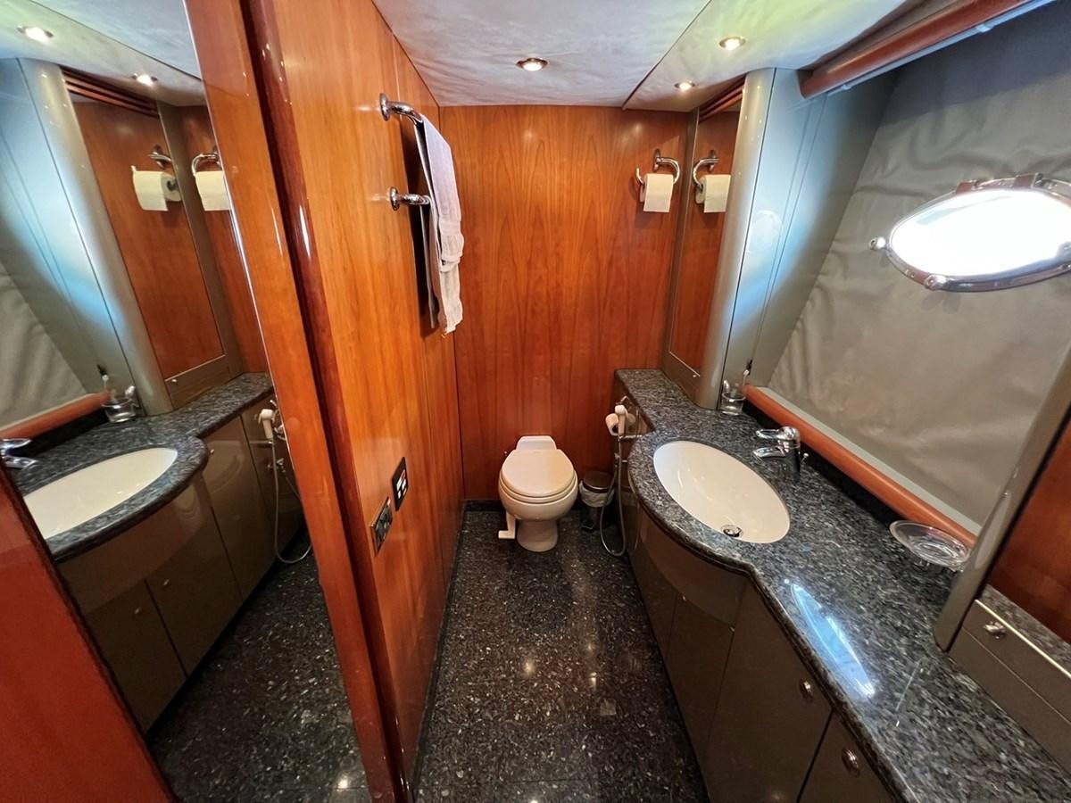 a bathroom with a marble counter top aboard SUNSEEKER 95 PREDATOR Yacht for Sale