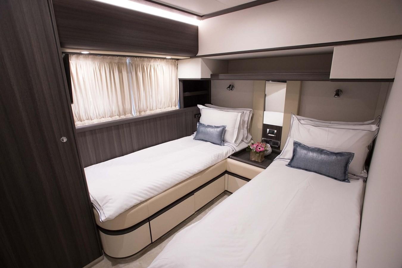 a couple of beds in a room aboard SOFIA D Yacht for Sale