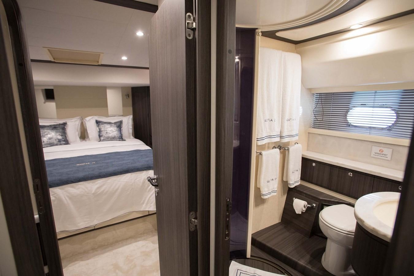 a small bathroom with a bed and a mirror aboard SOFIA D Yacht for Sale