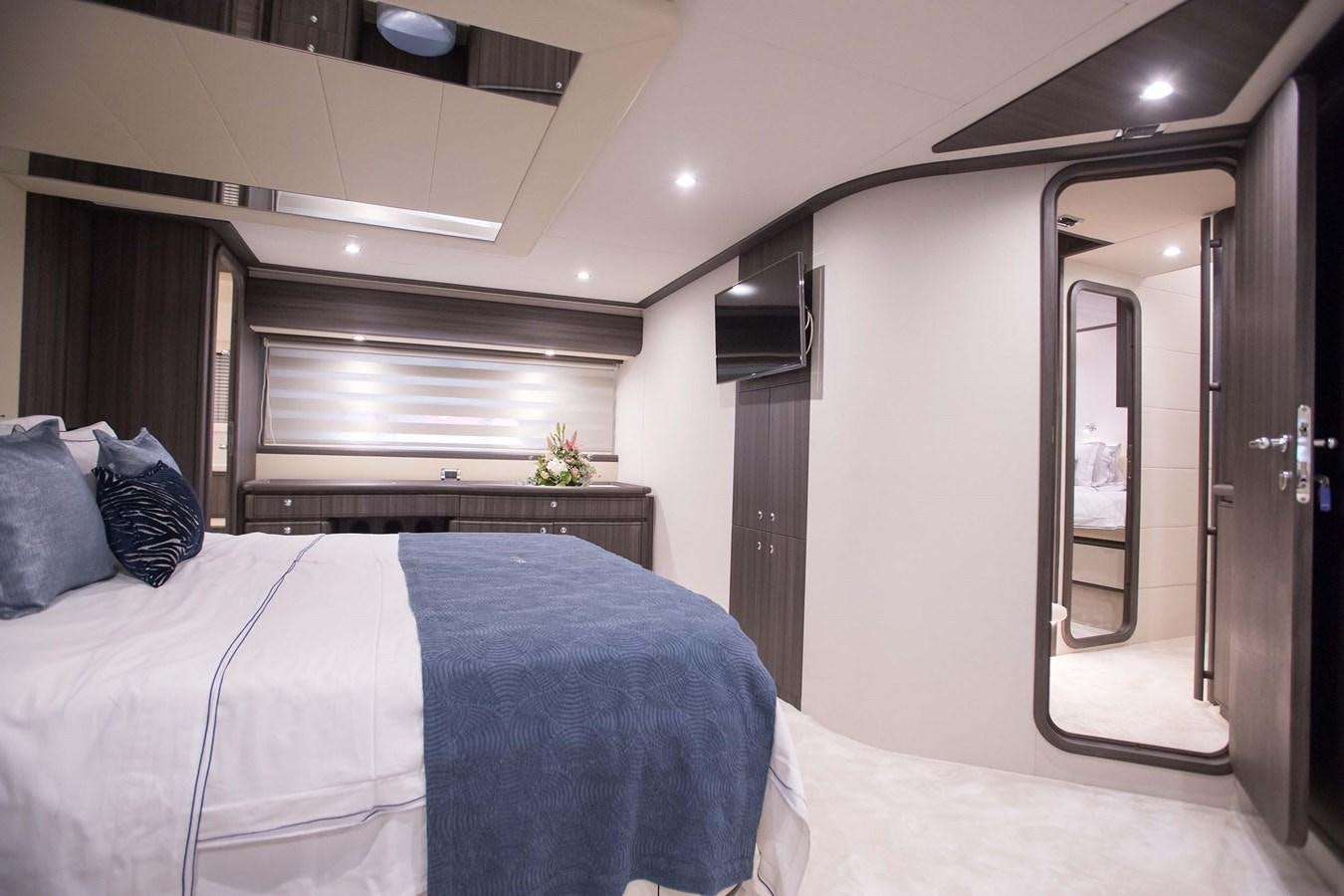 a bed in a room aboard SOFIA D Yacht for Sale