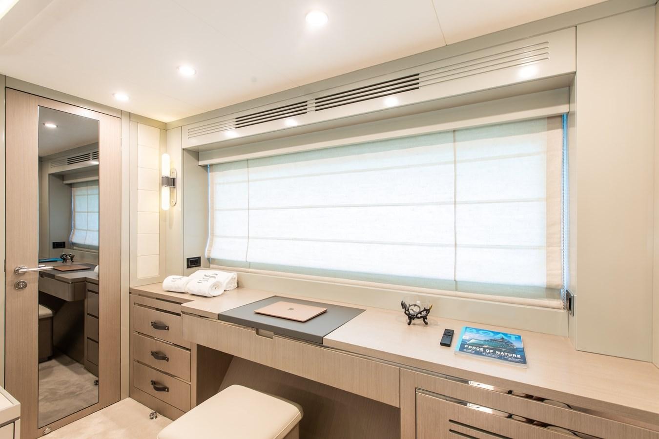a bathroom with a countertop sink and a window aboard MY LADY Y Yacht for Sale