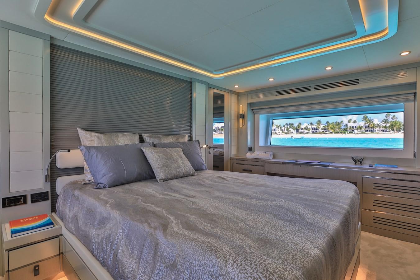 a bed with a large bed aboard MY LADY Y Yacht for Sale