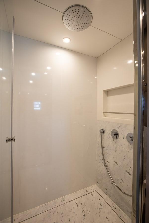 a shower with a round mirror aboard MY LADY Y Yacht for Sale