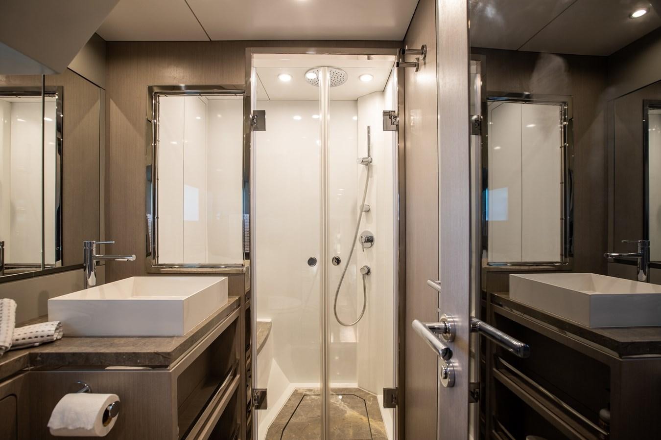 a bathroom with a shower and sink aboard MY LADY Y Yacht for Sale