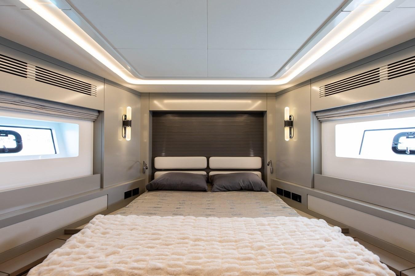 a bed in a room aboard MY LADY Y Yacht for Sale