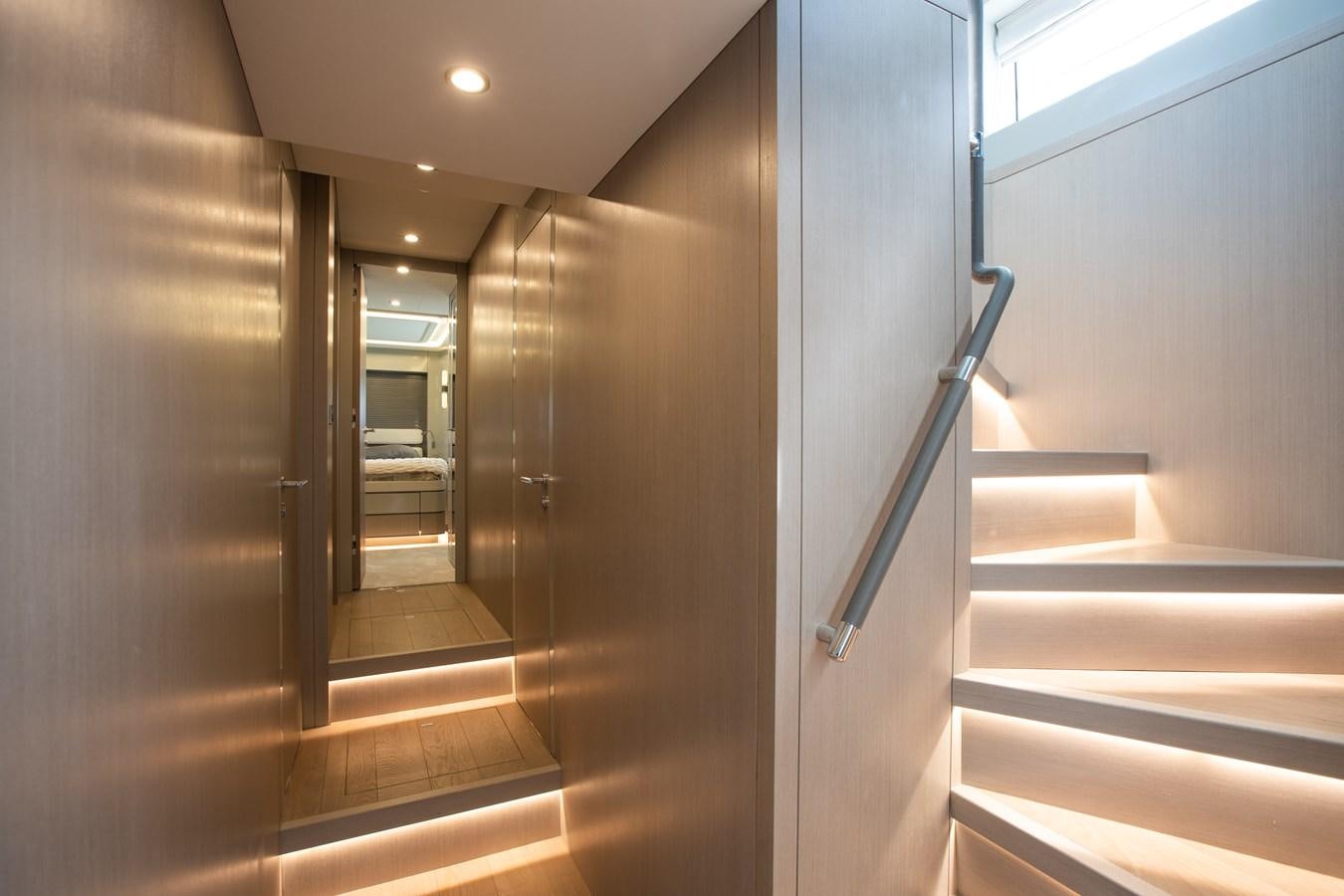 a hallway with a glass door aboard MY LADY Y Yacht for Sale
