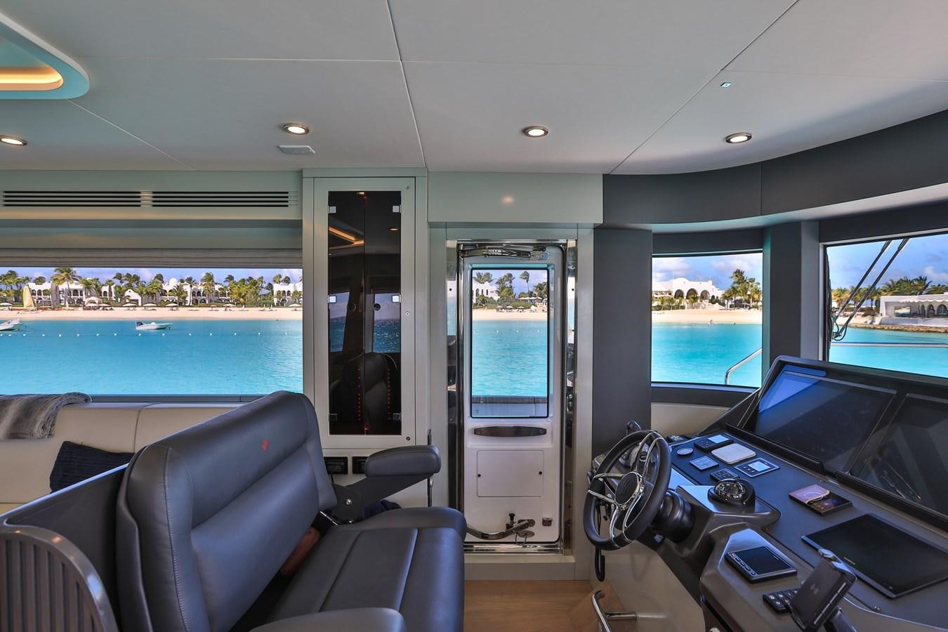 inside of a vehicle with a view of the water and the city aboard MY LADY Y Yacht for Sale
