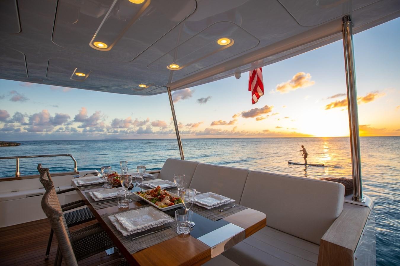 a table with food on it aboard MY LADY Y Yacht for Sale