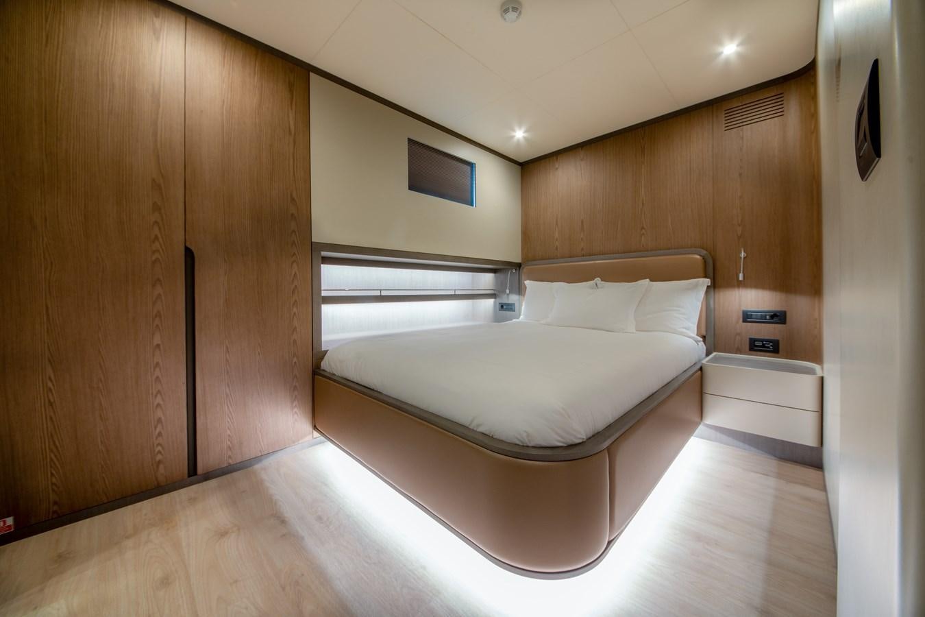 a bed in a room aboard PURA-VIDA Yacht for Sale