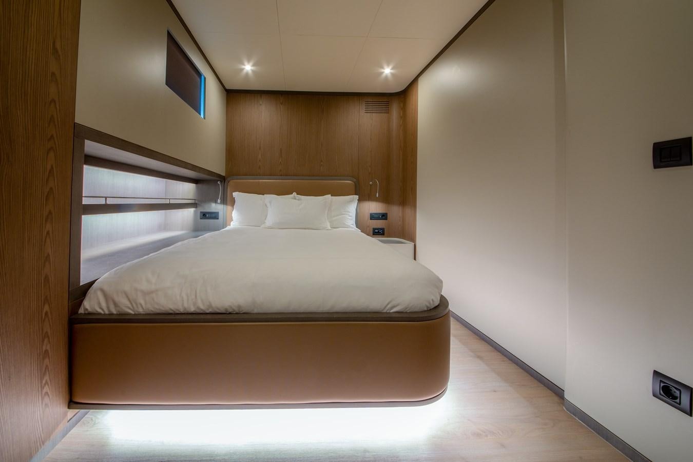 a bed in a room aboard PURA-VIDA Yacht for Sale