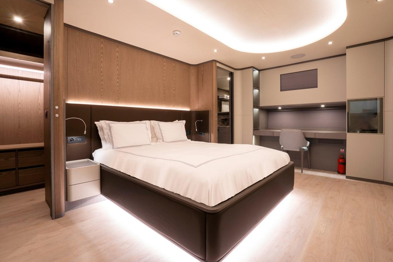 a large bed in a room aboard PURA-VIDA Yacht for Sale