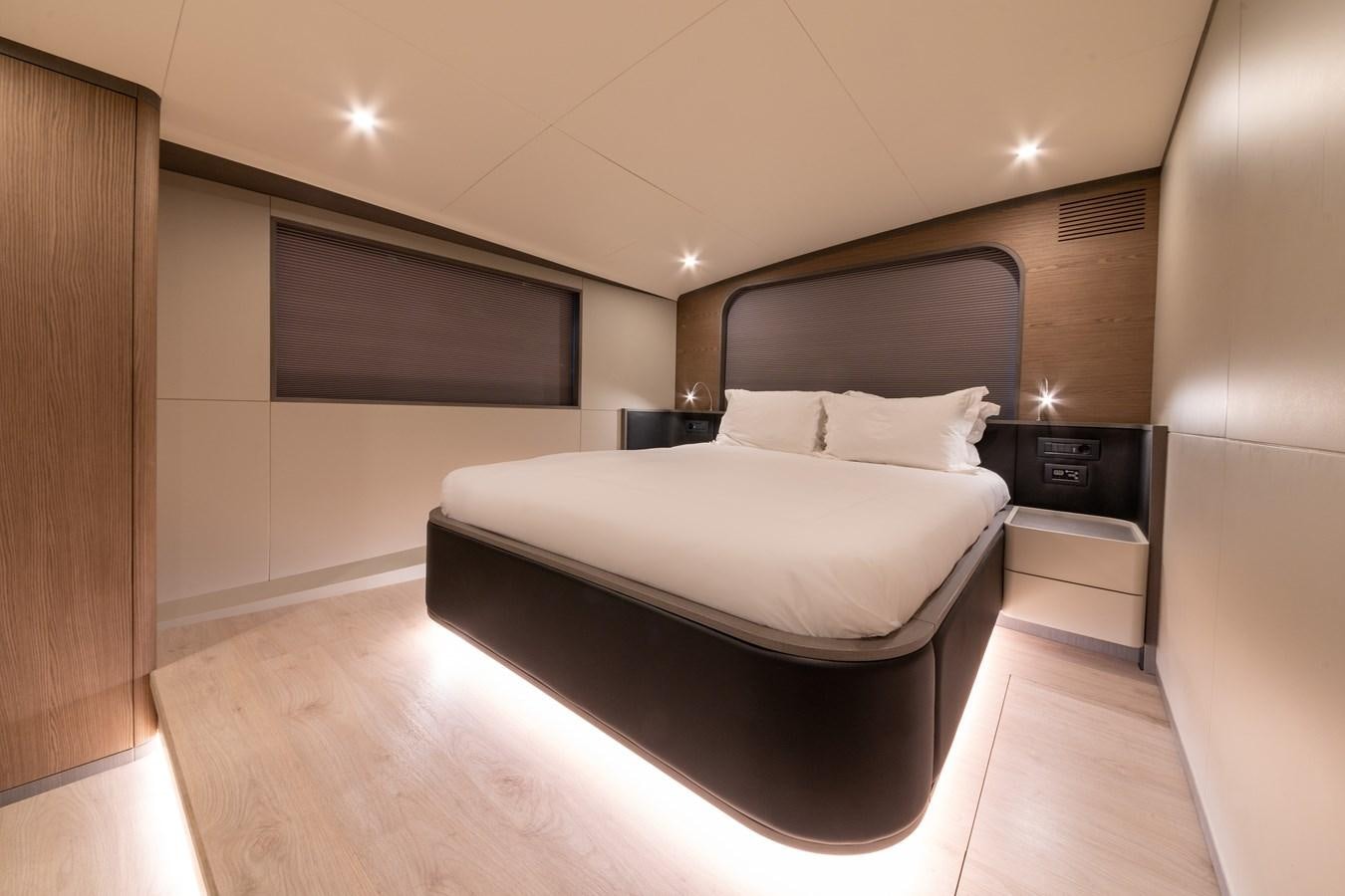 a bed in a room aboard PURA-VIDA Yacht for Sale