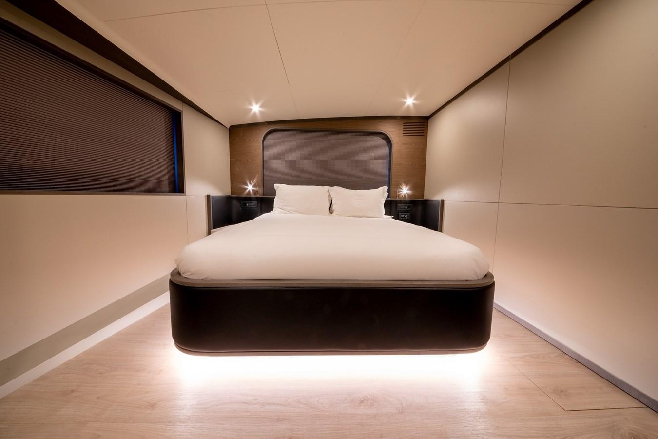 a bed in a room aboard PURA-VIDA Yacht for Sale