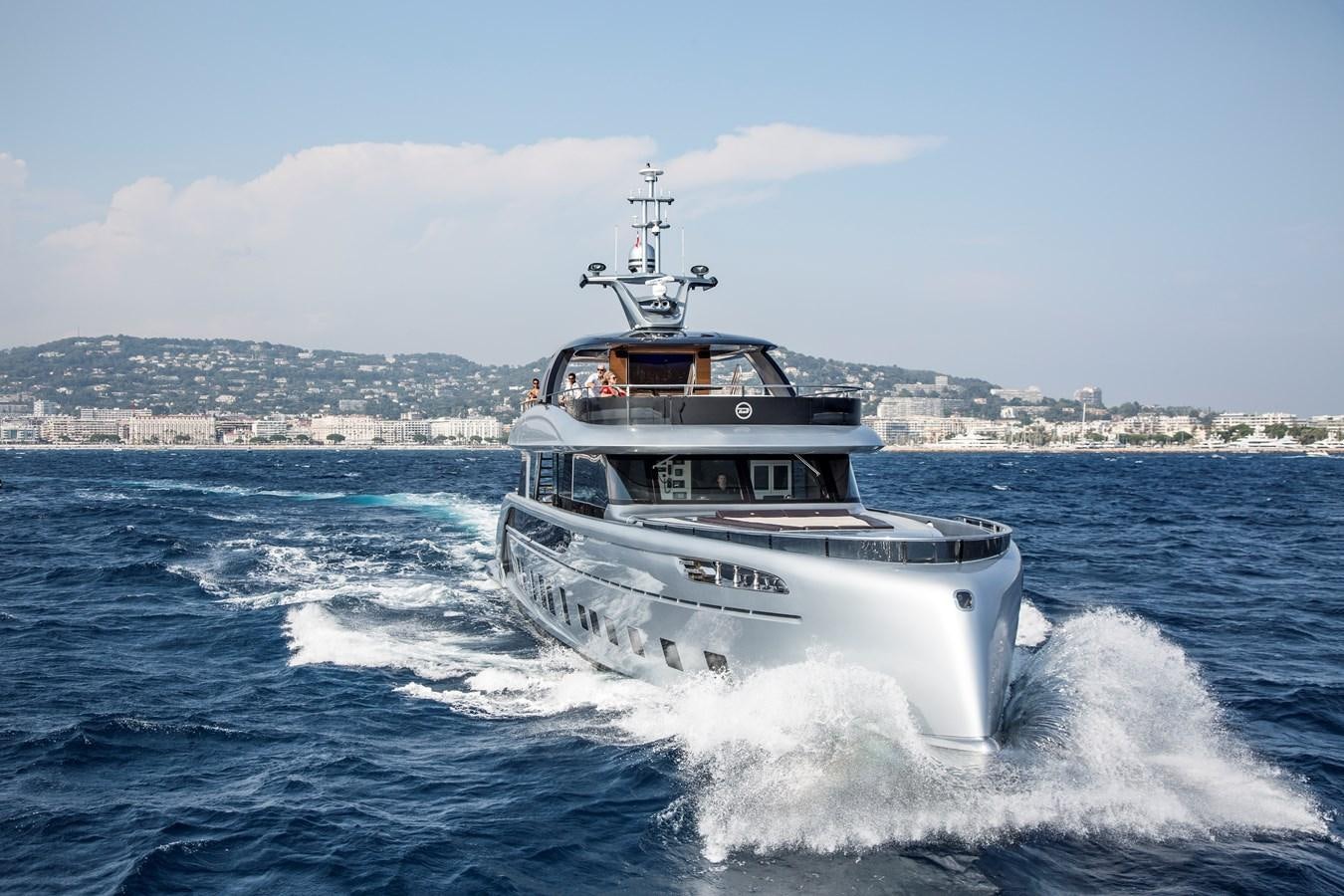 a boat on the water aboard DYNAMIQ GTT 115  Yacht for Sale