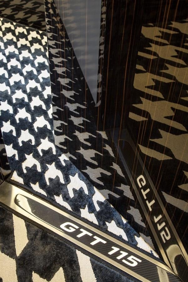 a black and white checkered floor aboard DYNAMIQ GTT 115  Yacht for Sale