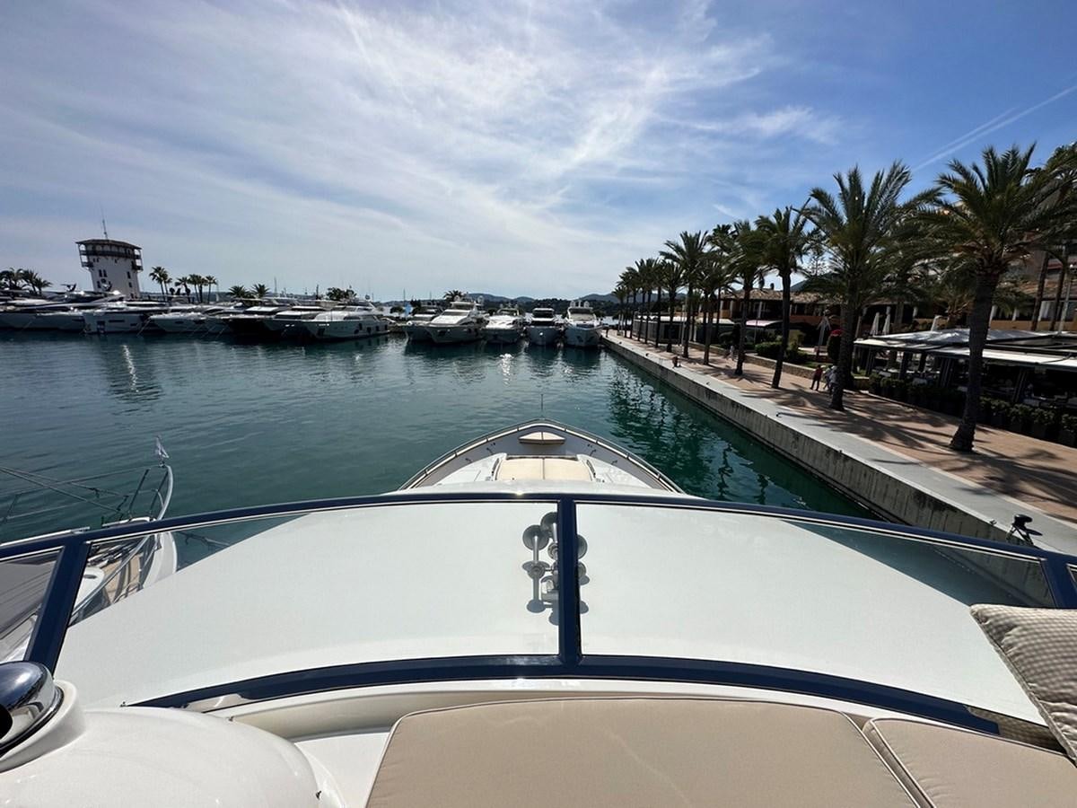 a pool with a deck and a view of a city aboard ESPRESSO Yacht for Sale