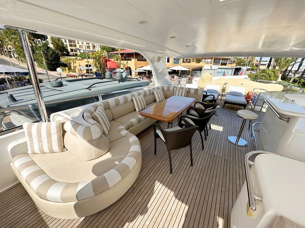 a room with a pool table and chairs aboard ESPRESSO Yacht for Sale