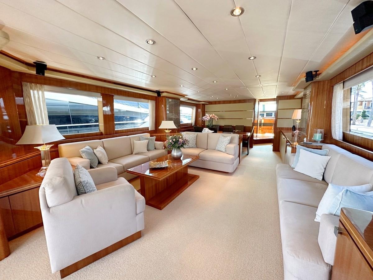a living room with a large window aboard ESPRESSO Yacht for Sale