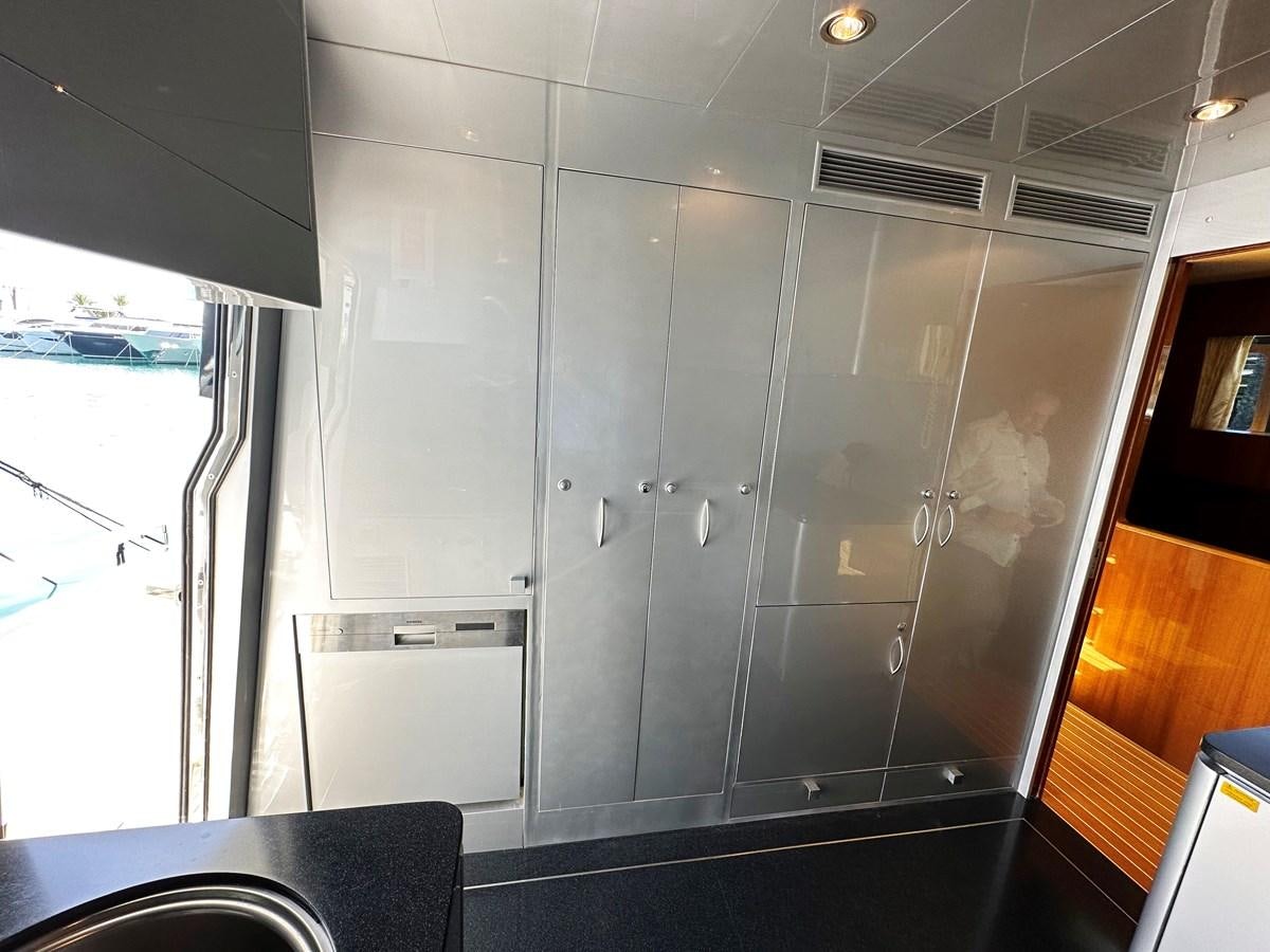 a large glass wall with glass doors aboard ESPRESSO Yacht for Sale