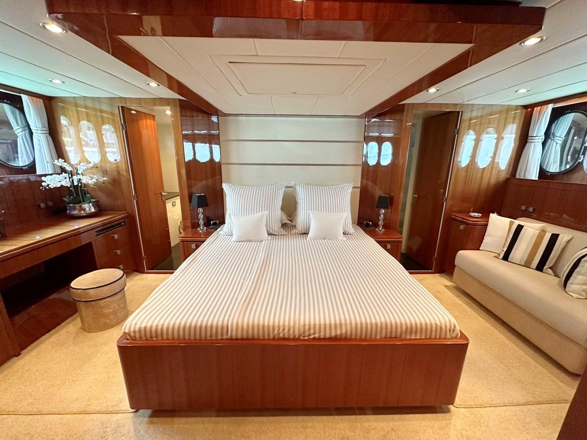 a bed in a room aboard ESPRESSO Yacht for Sale