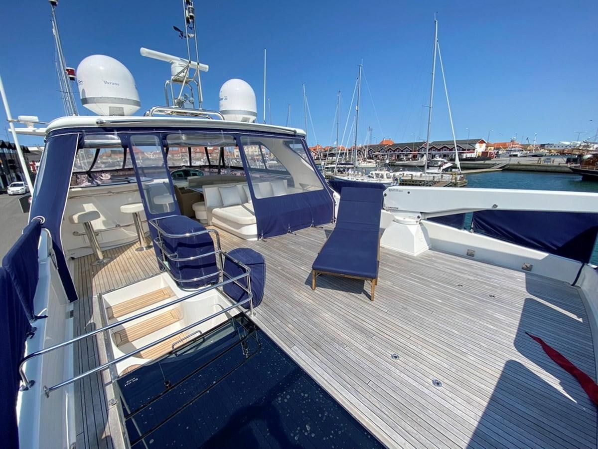a boat docked at a pier aboard MARACAIBO Yacht for Sale