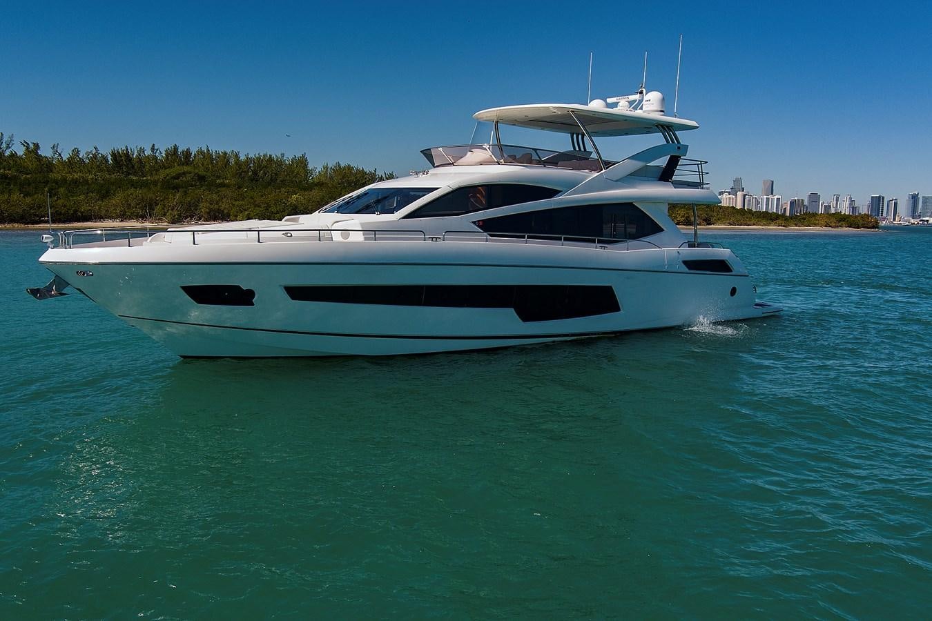 a white yacht in the water aboard MISTY K Yacht for Sale