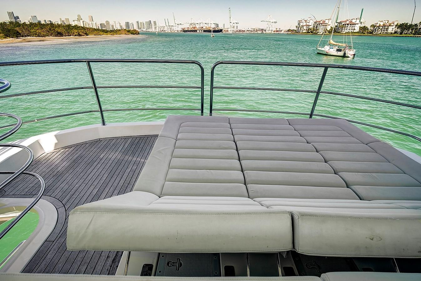 a deck overlooking a body of water aboard MISTY K Yacht for Sale