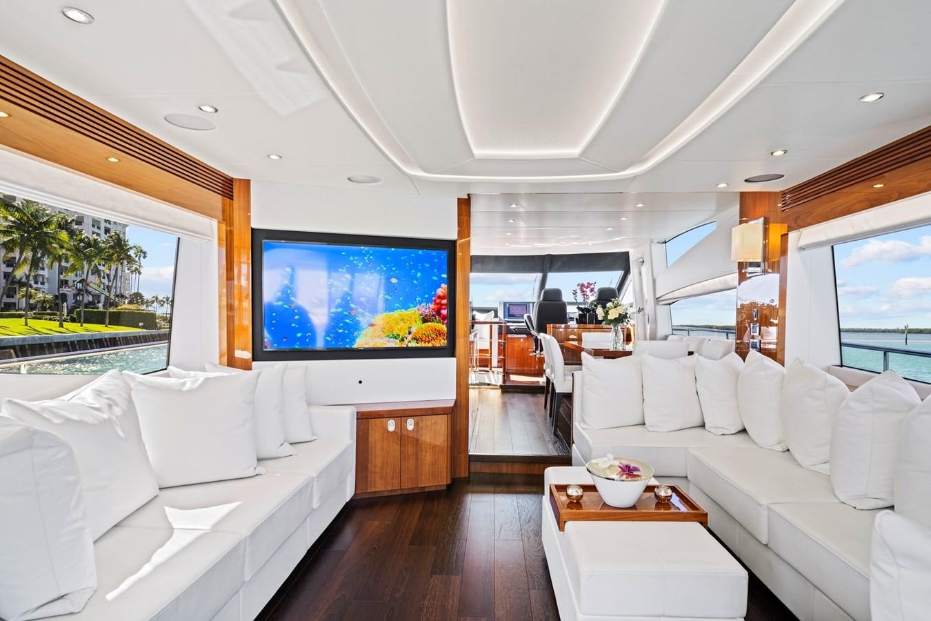 a room with a bed and a television aboard MISTY K Yacht for Sale