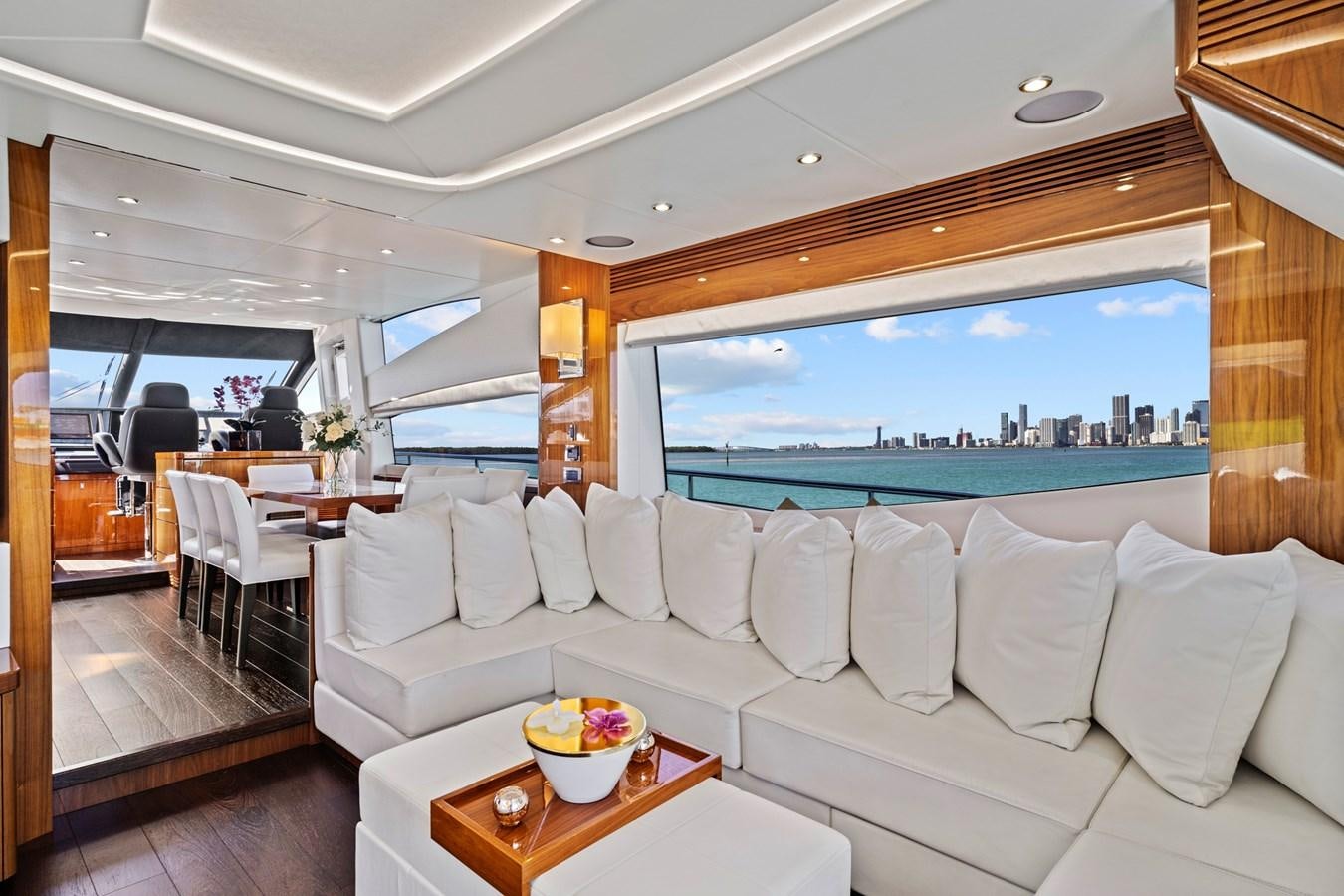 a living room with a large window aboard MISTY K Yacht for Sale