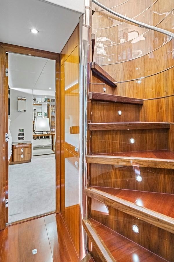 a room with wooden cabinets aboard MISTY K Yacht for Sale