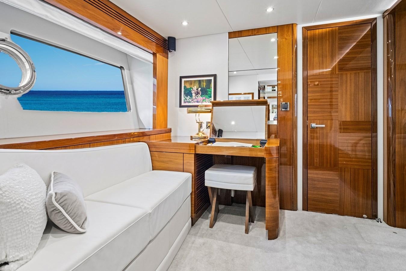 a room with a bed and a desk aboard MISTY K Yacht for Sale