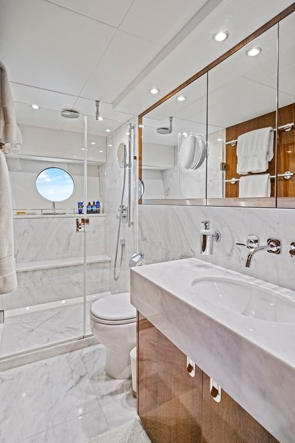 a bathroom with a sink and a toilet aboard MISTY K Yacht for Sale