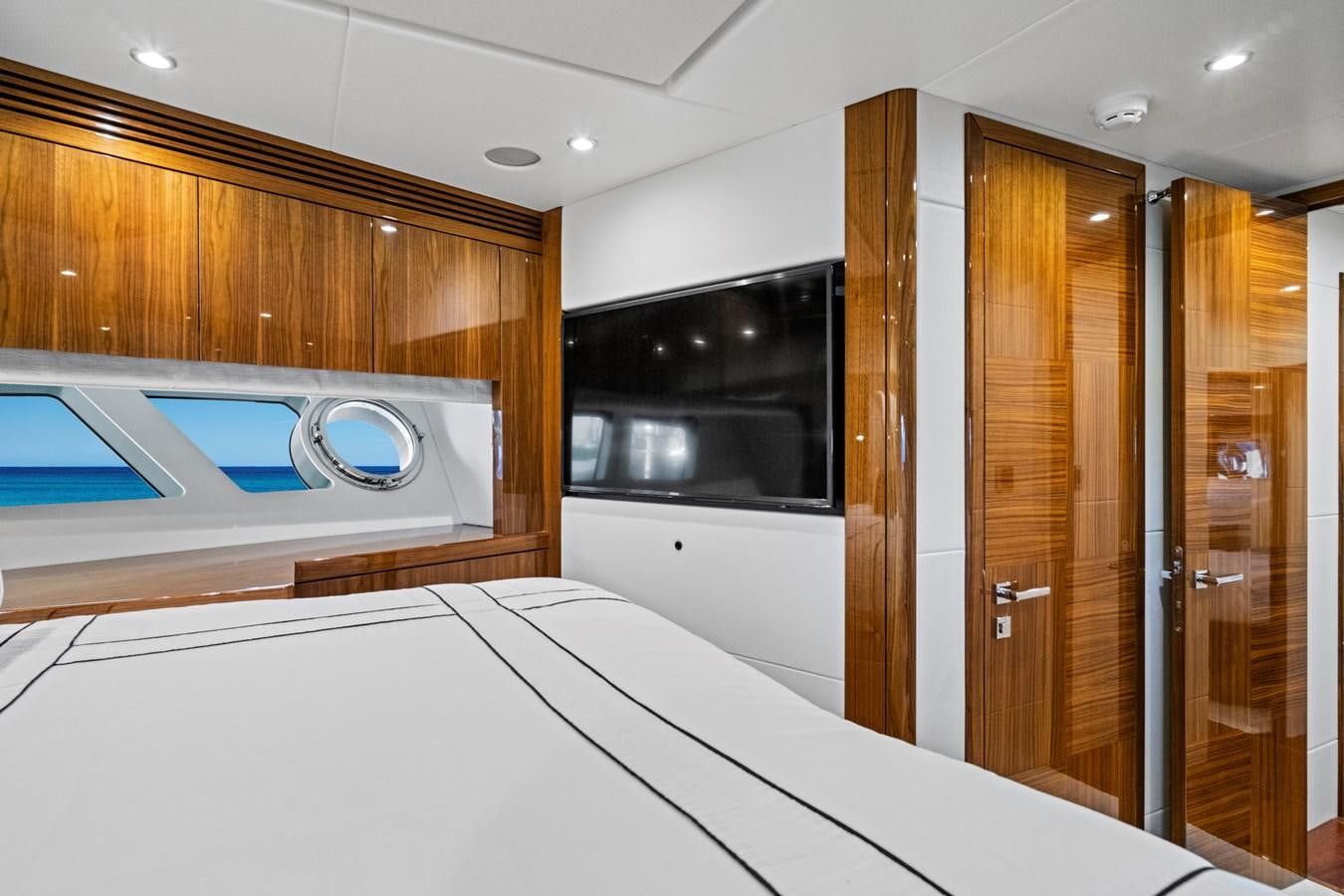 a room with a large mirror and a closet aboard MISTY K Yacht for Sale