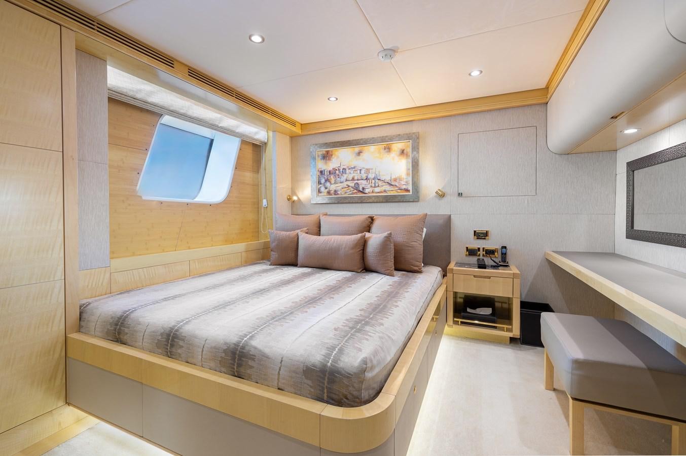 a bed in a room aboard LADY TAHITI Yacht for Sale