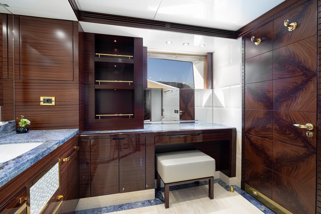 a bathroom with a sink and cabinets aboard LADY TAHITI Yacht for Sale