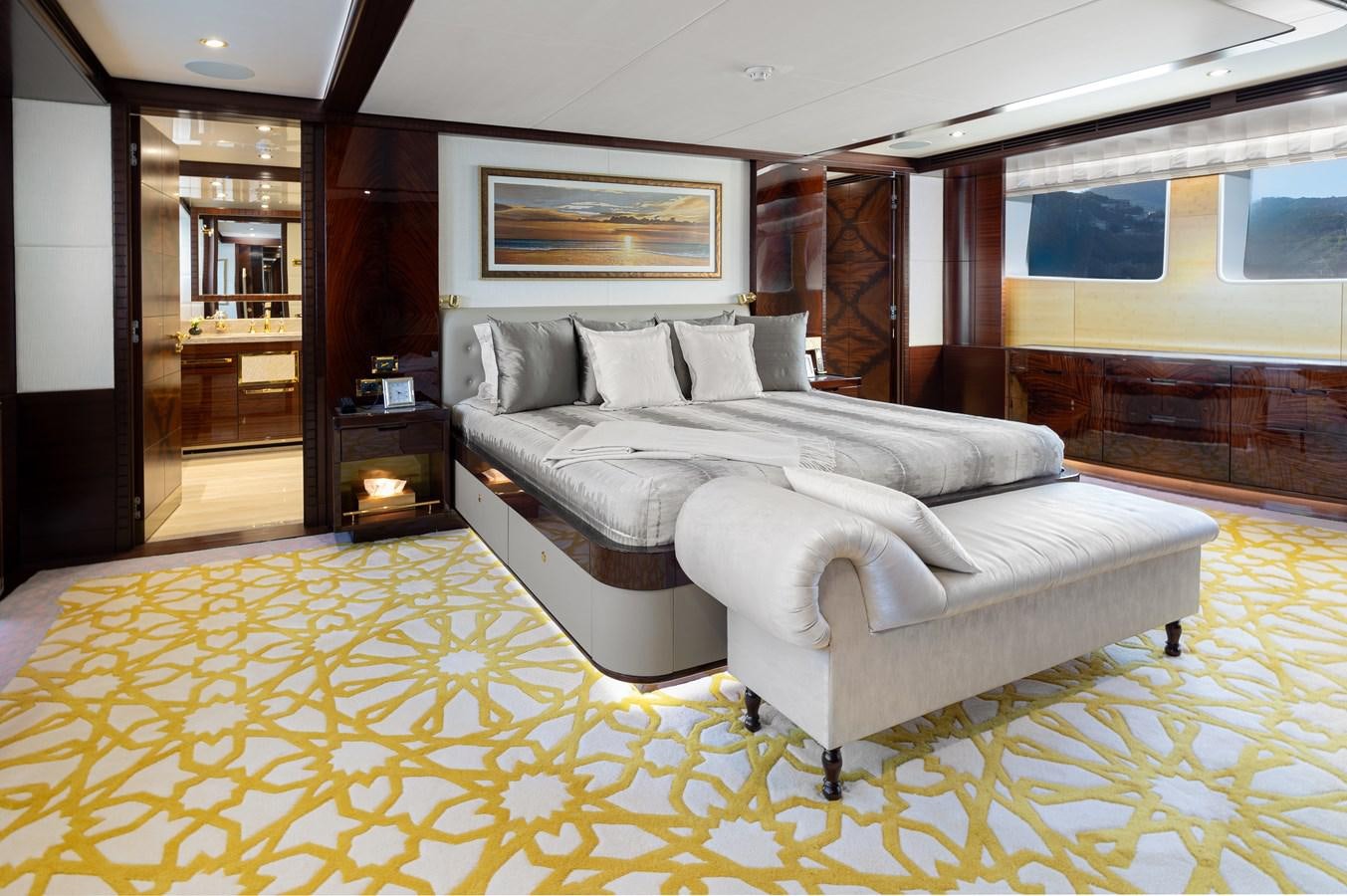 a large white couch in a room aboard LADY TAHITI Yacht for Sale